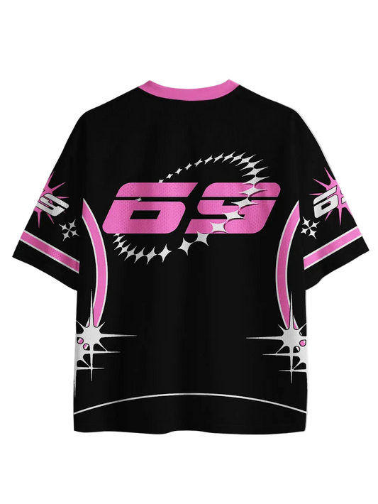 A black short-sleeve t-shirt with a pink and white graphic design on the back, featuring a large '69' logo and starburst patterns, displayed on a clean white background.
