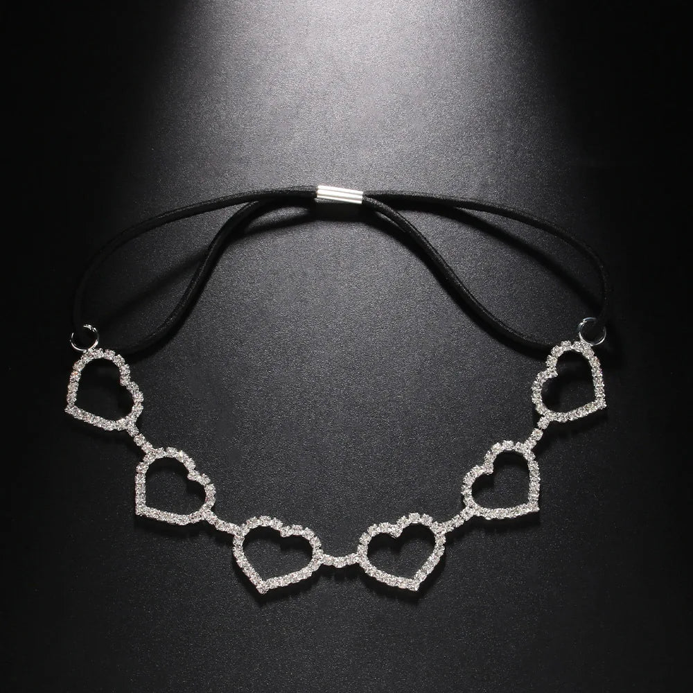 Necklace with heart-shaped links on a black background