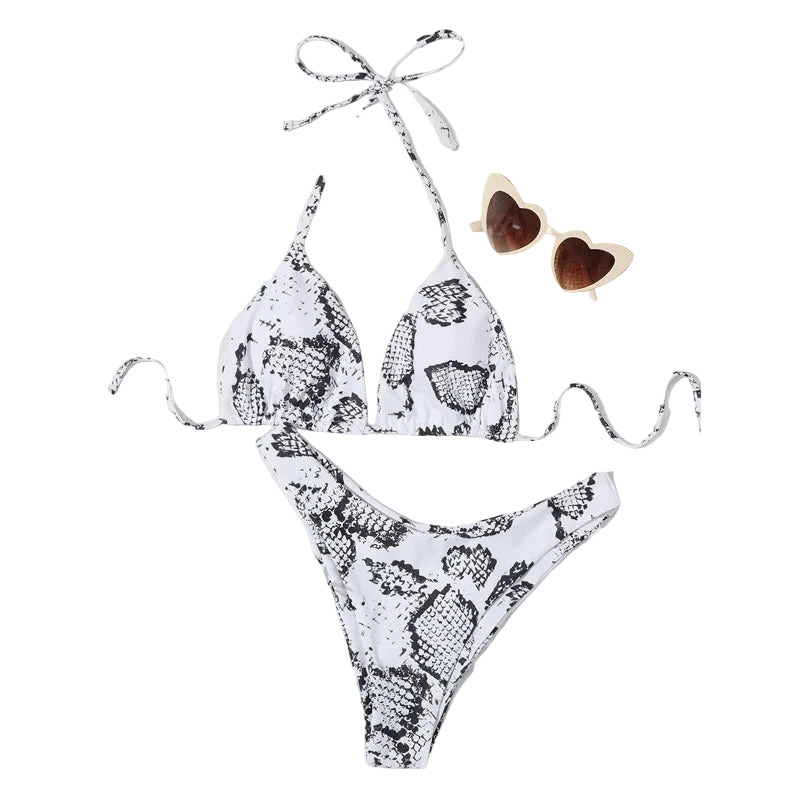 Snakeskin-patterned bikini set with a hat and sunglasses on a white background