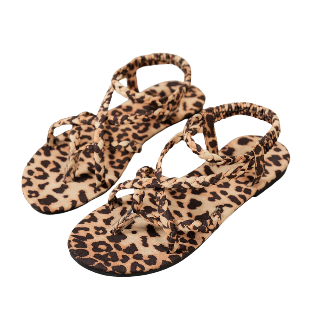 Leopard print sandals on a wooden surface