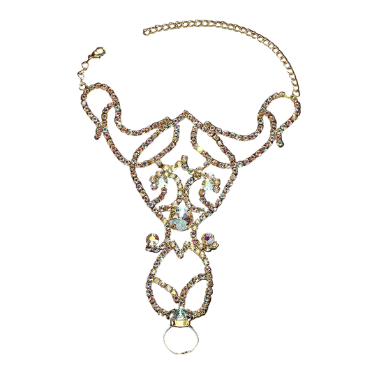 Gold-tone filigree collar necklace embellished with iridescent rhinestones and a central clear crystal, displayed on a dark background.