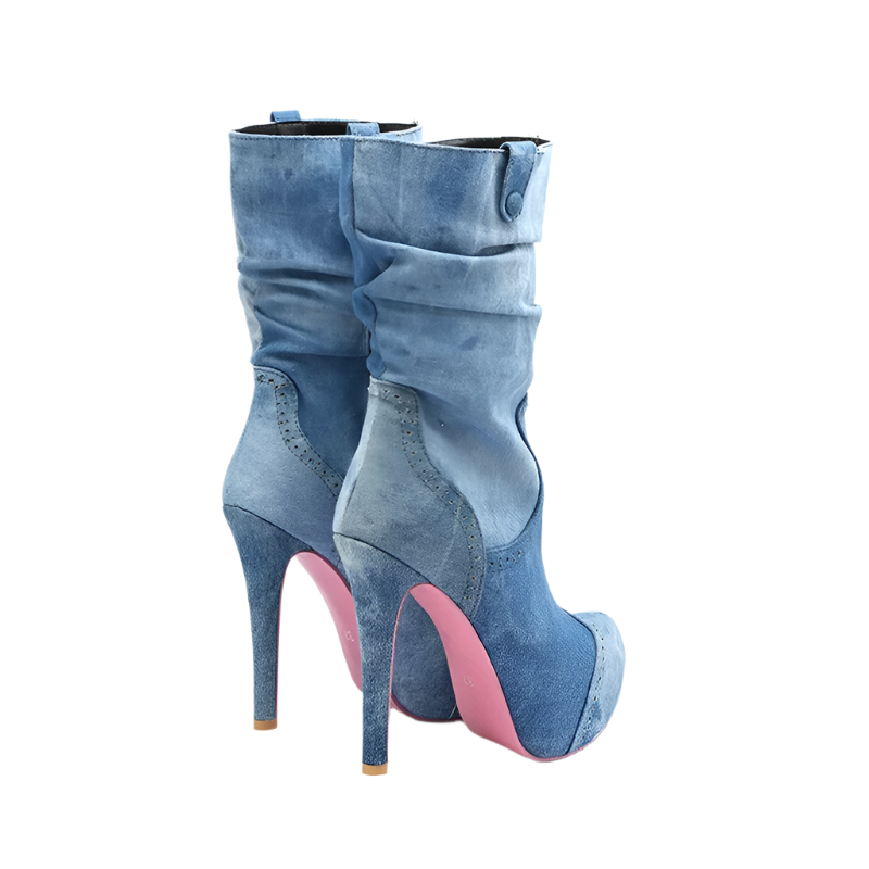 Blue denim high-heeled boots with pink soles on a white background