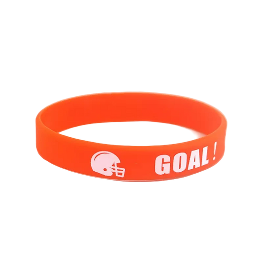 An orange silicone wristband featuring a white football helmet logo and the text 'GOAL!' printed in white, shown on a plain white background.