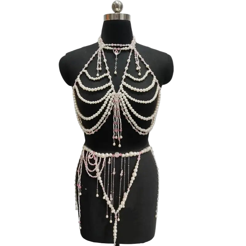 Pearl embellished halter top and skirt set on a mannequin against a white background