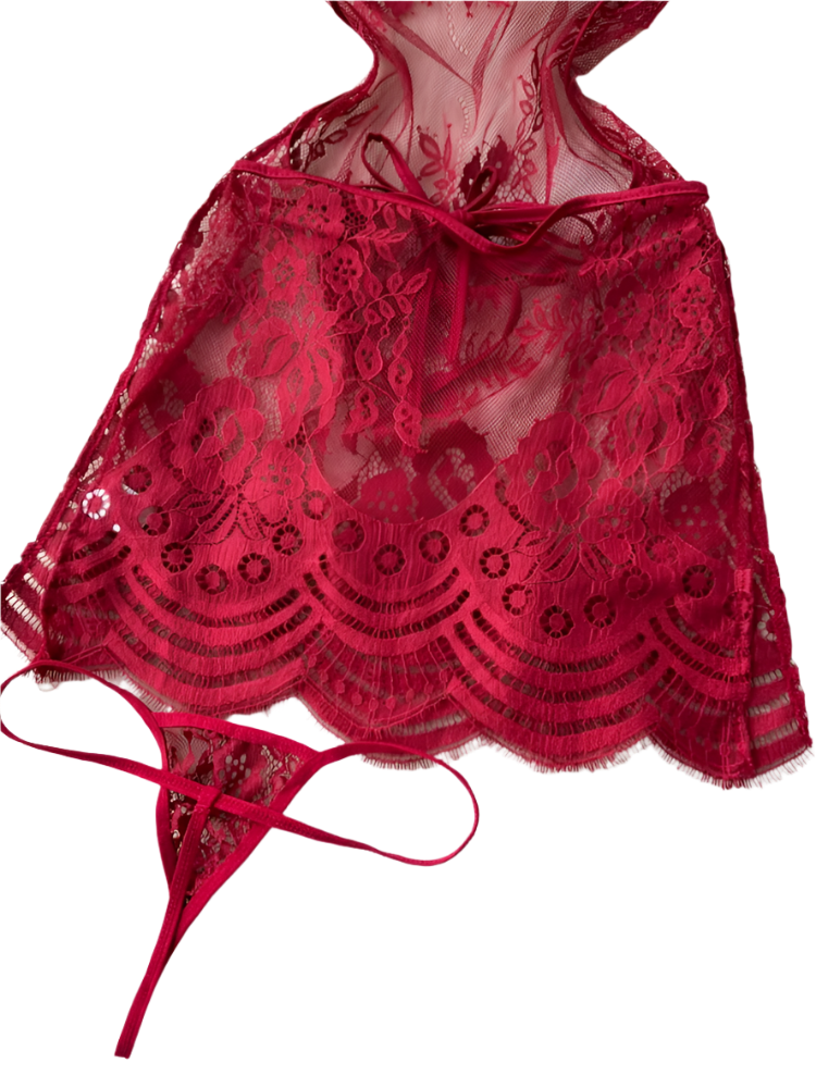 Red lace lingerie set on a white textured surface