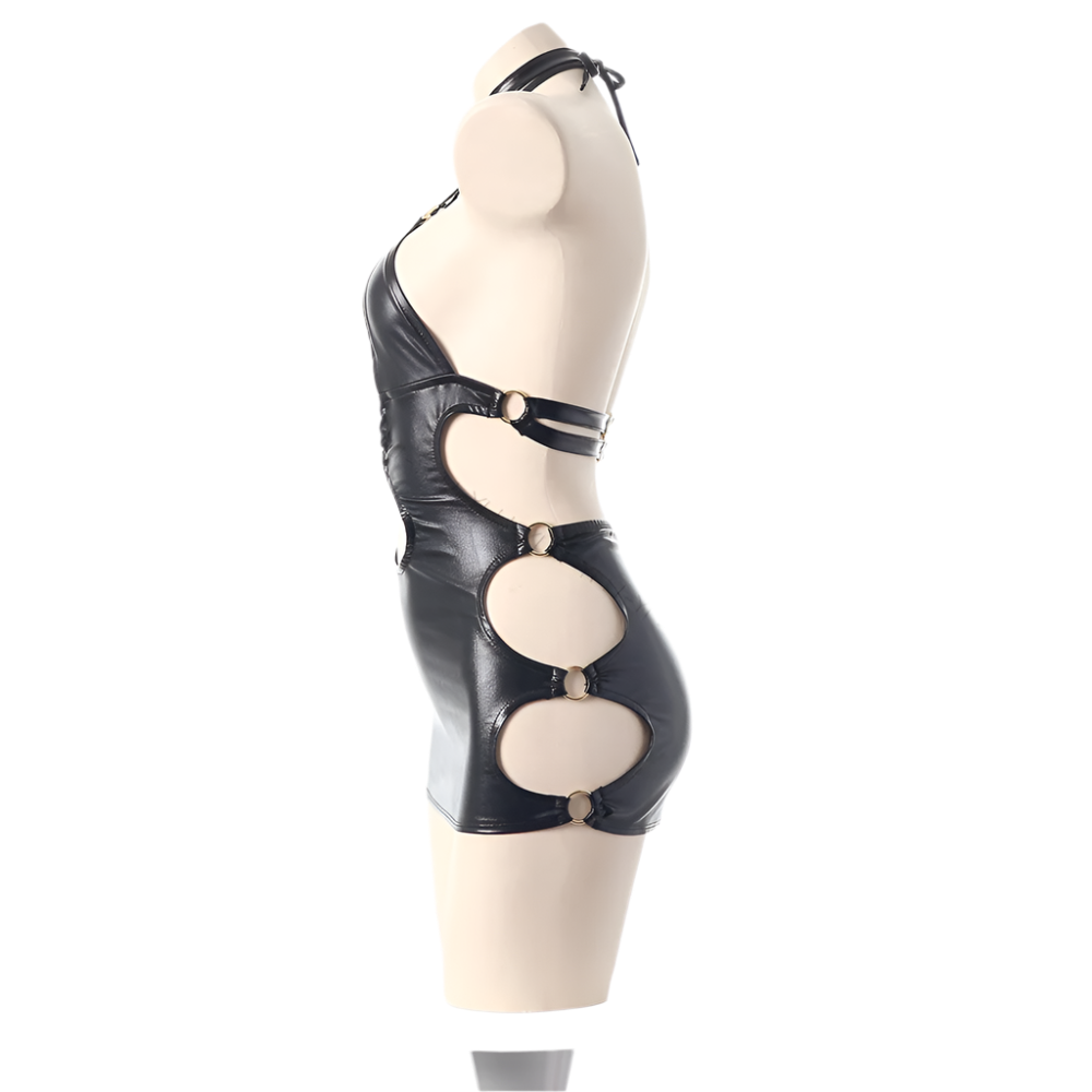 Black leather harness on a mannequin against a white background