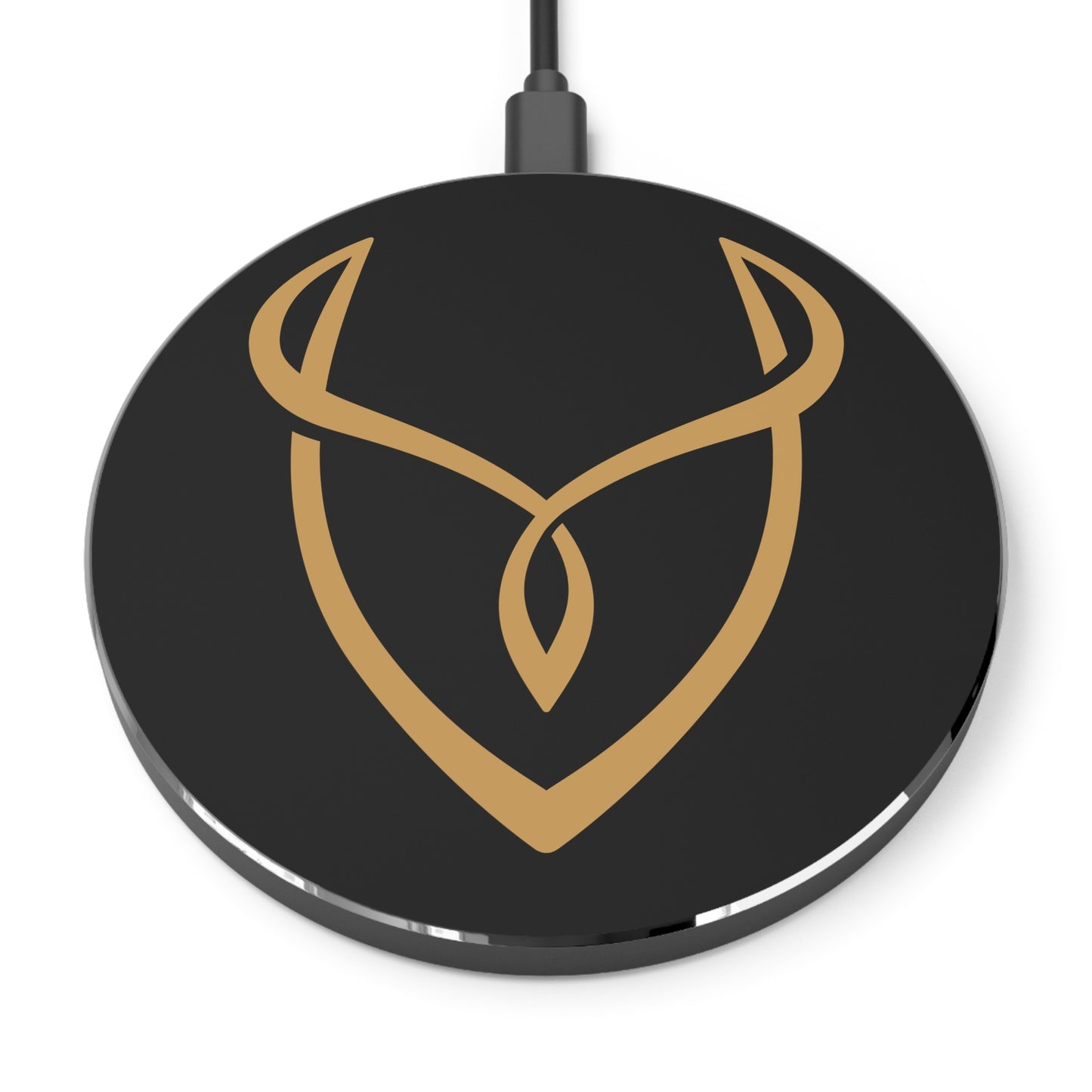 Black wireless charging pad with gold logo on a white background