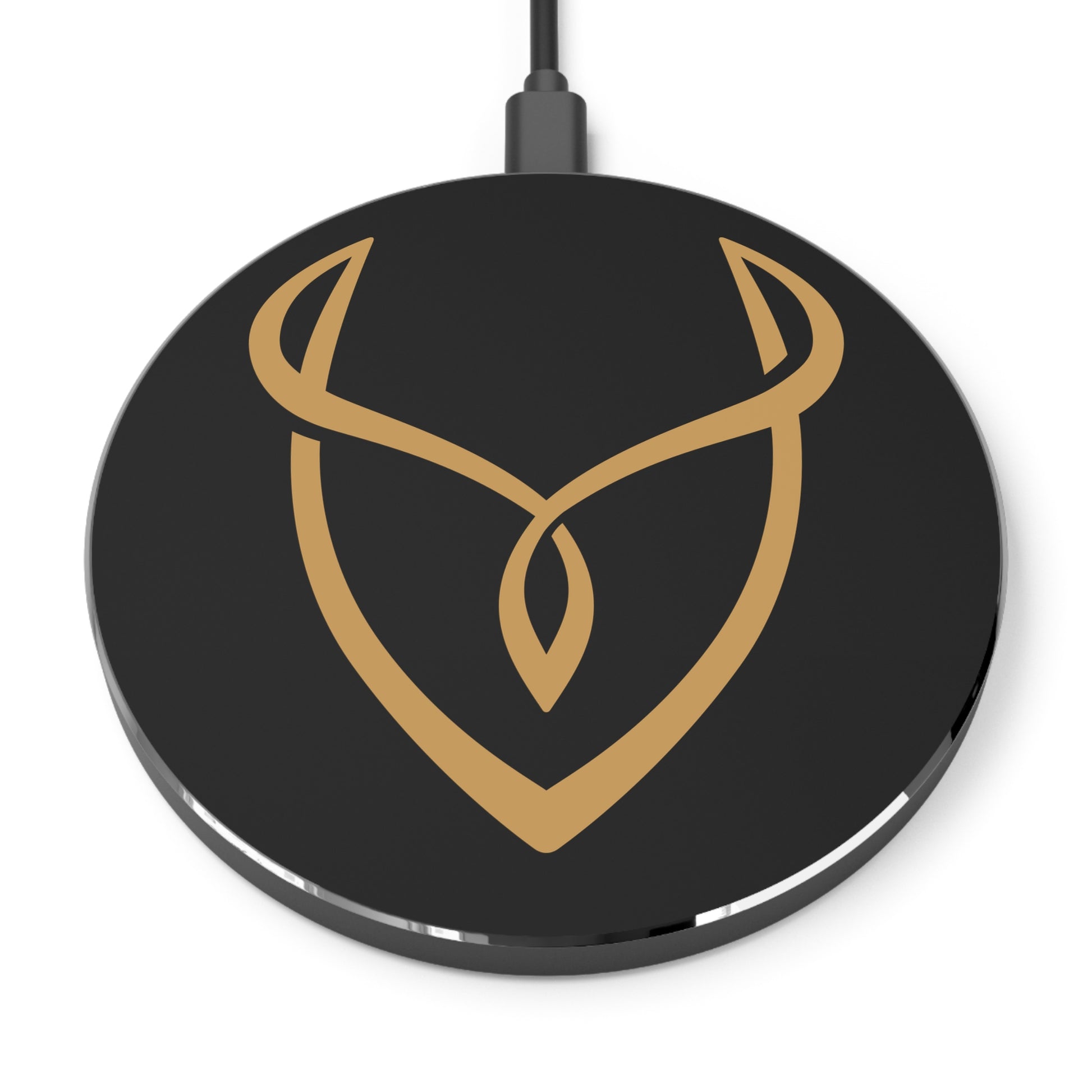 Black wireless charging pad with gold logo on a white background