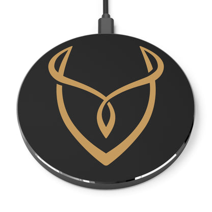 Black wireless charging pad with gold logo on a white background