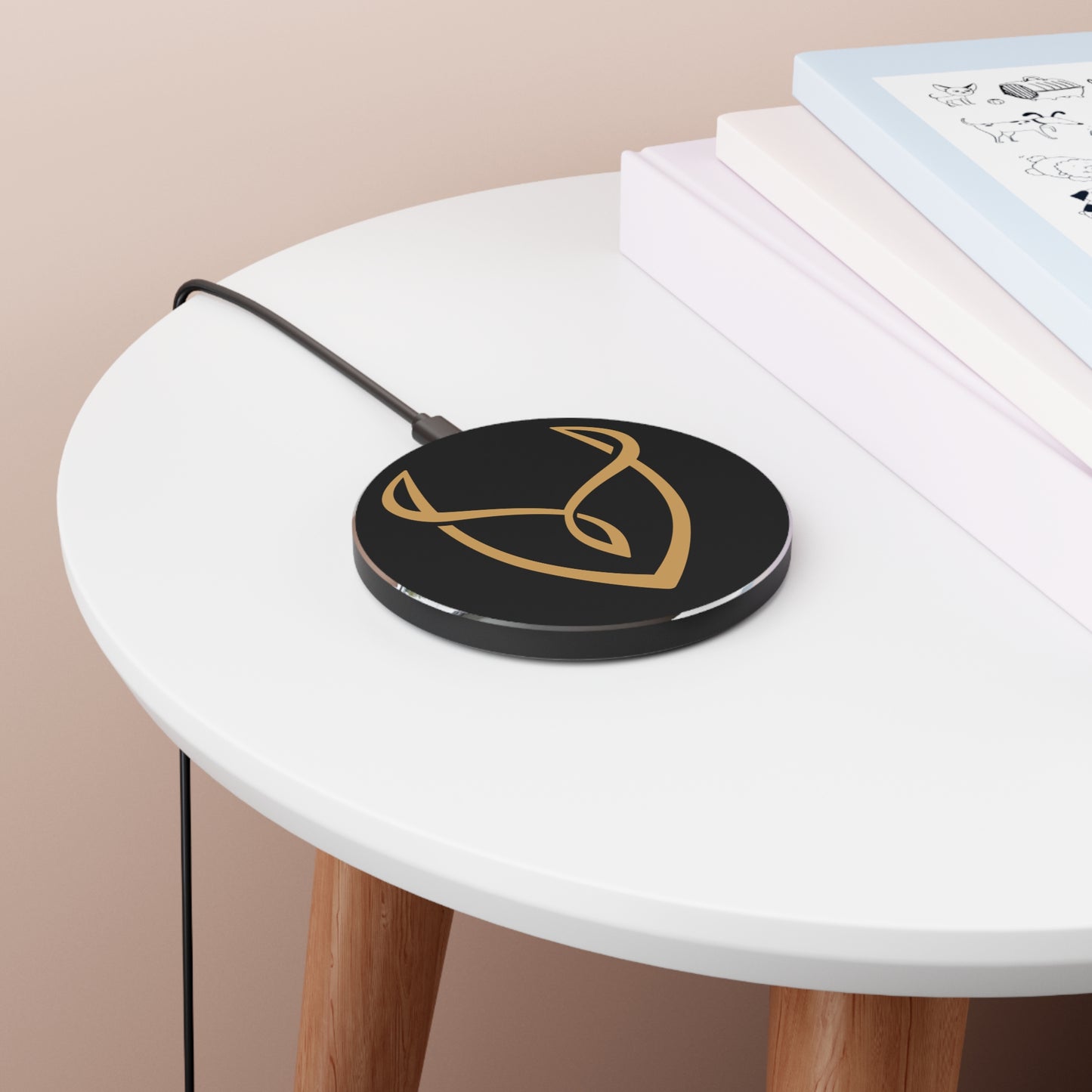 Wireless charging pad with a logo on a white table