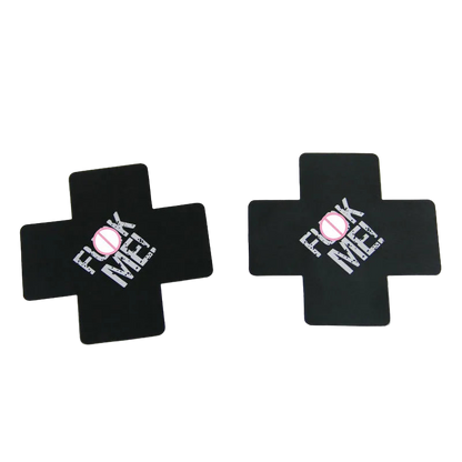 Black cross-shaped stickers with 'F**K ME!' text on a white background
