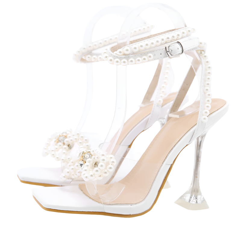 Modern transparent PVC sandals with pearl and crystal details - perfect for resort evenings

