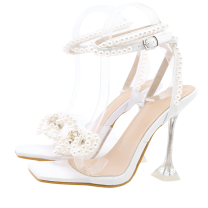 Modern transparent PVC sandals with pearl and crystal details - perfect for resort evenings

