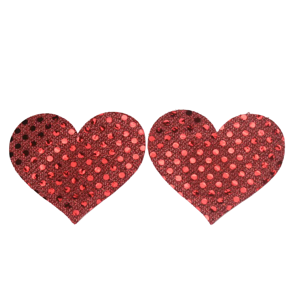 Red heart-shaped pasties with polka dot pattern on a white background