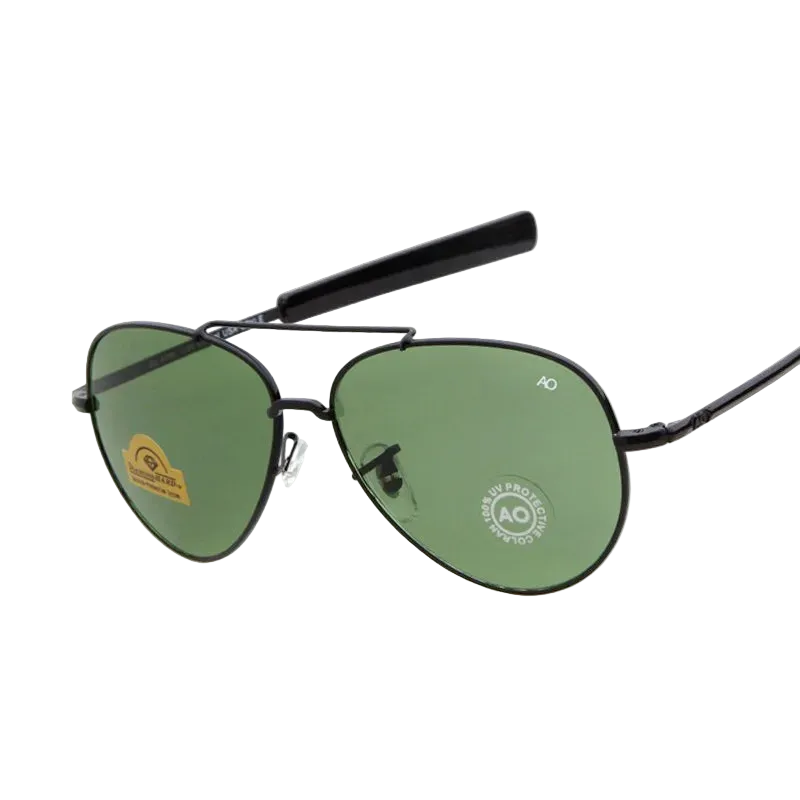 A pair of aviator-style sunglasses with a thin black metal frame and green tinted lenses, shown on a plain white background 