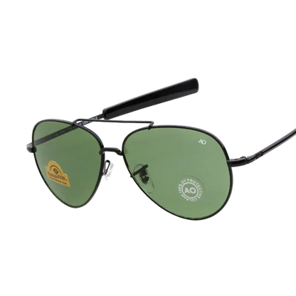 A pair of aviator-style sunglasses with a thin black metal frame and green tinted lenses, shown on a plain white background 