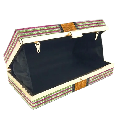 Open jewelry box with colorful striped lid on a white background