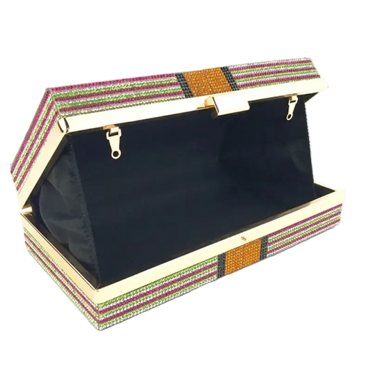 Open jewelry box with colorful striped lid on a white background