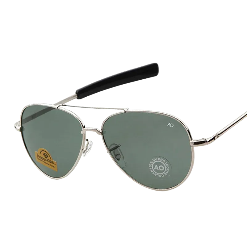 Silver metal aviator sunglasses with green-tinted lenses and black temple arms, shown on a white background 