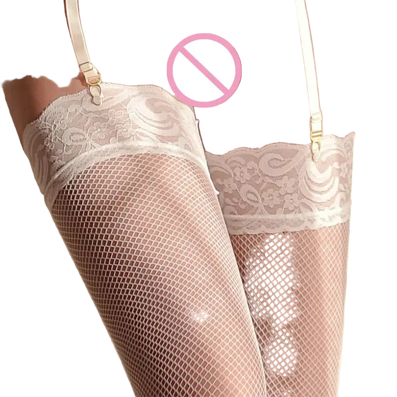 White lace and fishnet thigh-high stockings with matching suspender straps, shown on a model's legs. A pink prohibition symbol is overlaid over the central area.
