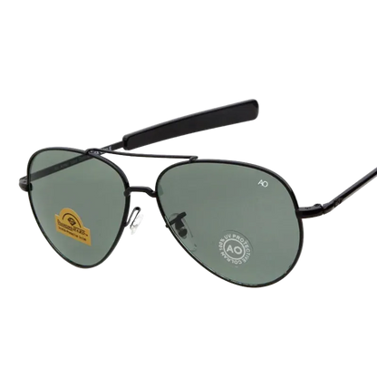 Who Cutie aviator sunglasses with a thin black metal frame and dark green tinted lenses, shown on a white background 