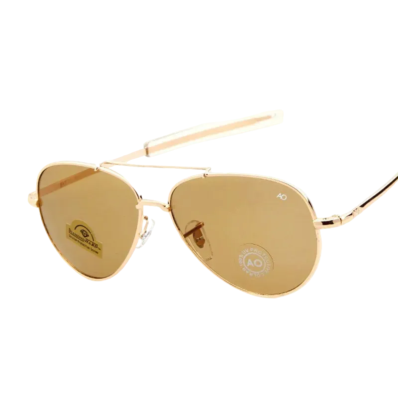Gold aviator sunglasses with gold-tinted lenses and a gold metal frame, shown on a white background 