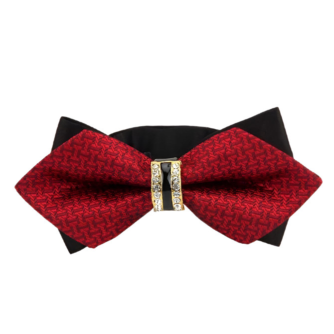 Red bow tie with black base and decorative clasp on a white background