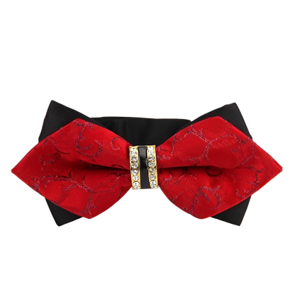 Red and black bow tie with a decorative clasp on a white background