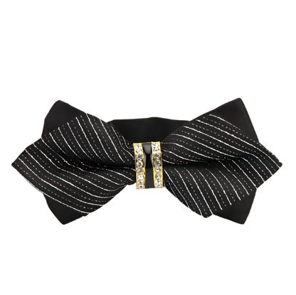 Black and white striped bow tie with a gold buckle on a white background
