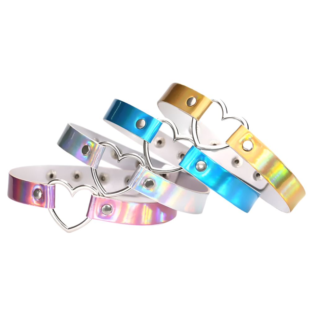Set of colorful metallic choker necklaces with heart designs on a white background
