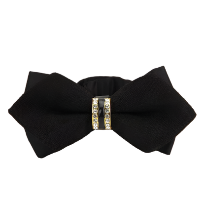 Black bow tie with a decorative clasp on a white background