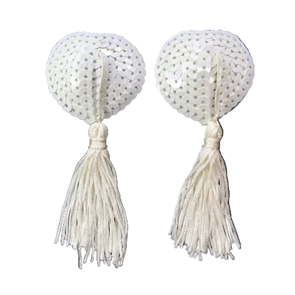 Pair of white sequin pasties with tassels on a black background