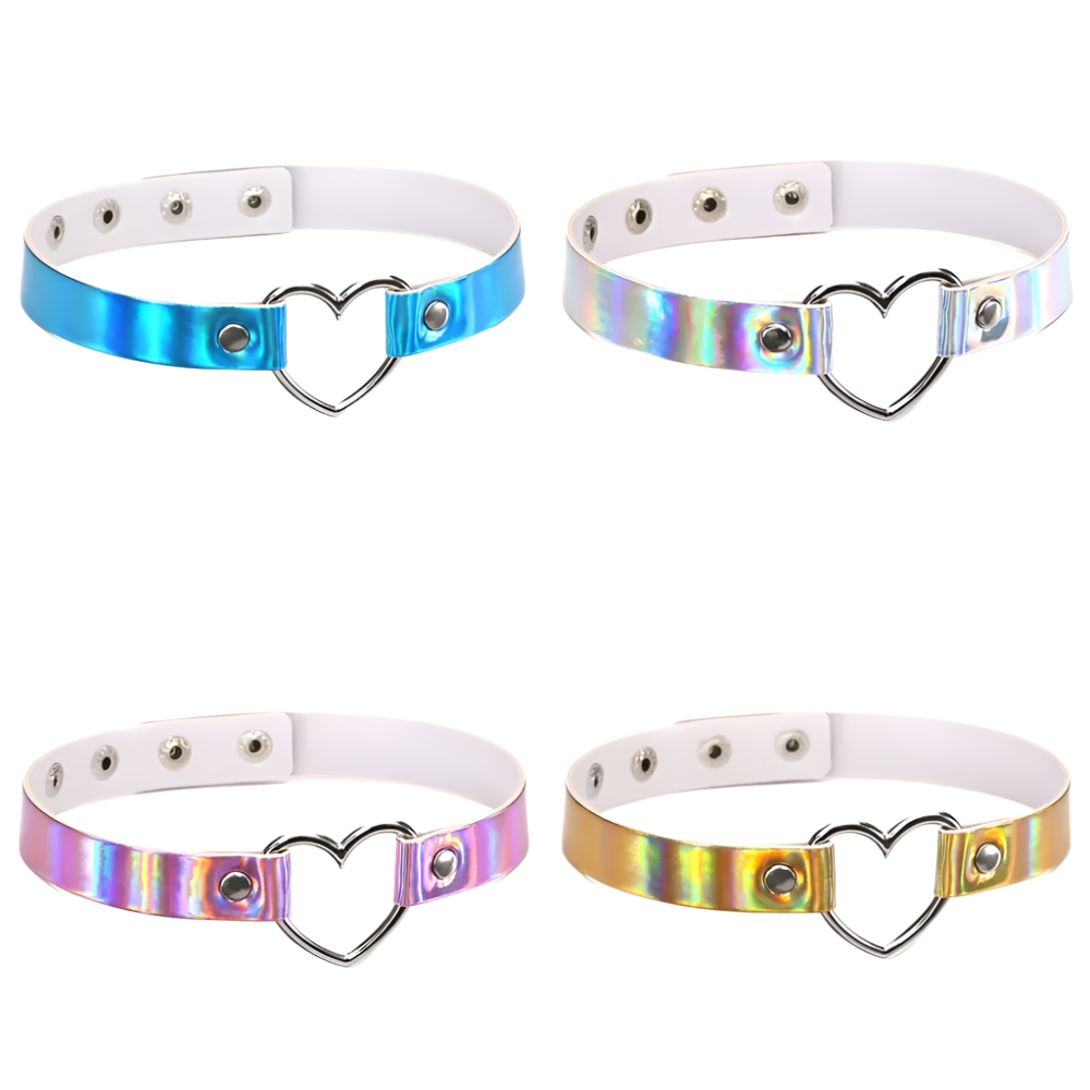 Four metallic chokers with heart designs on a white background
