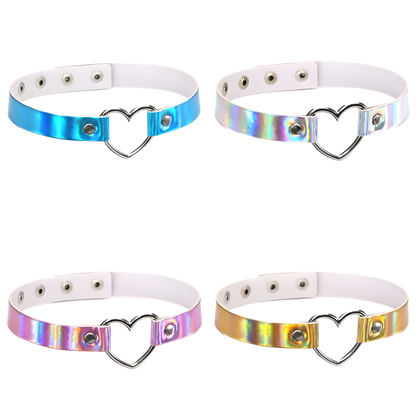 Four metallic chokers with heart designs on a white background