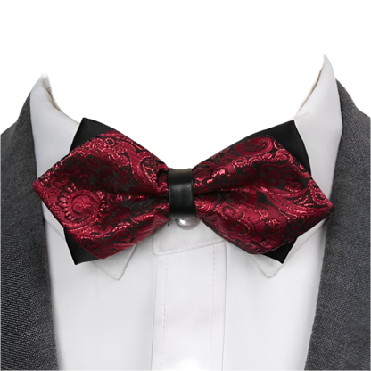 Red paisley bow tie on a mannequin with a white shirt and gray jacket.
