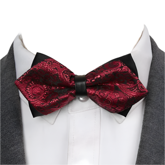 Red paisley bow tie on a mannequin with a white shirt and gray jacket.