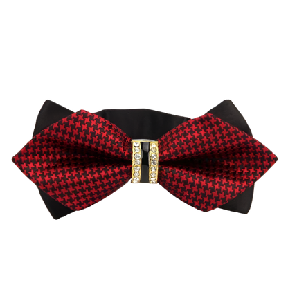 Red and black checkered bow tie with a gold center on a white background