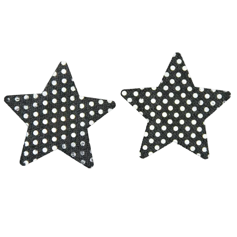 Two black star-shaped accessories with a white polka dot pattern, displayed side by side on a plain white background.