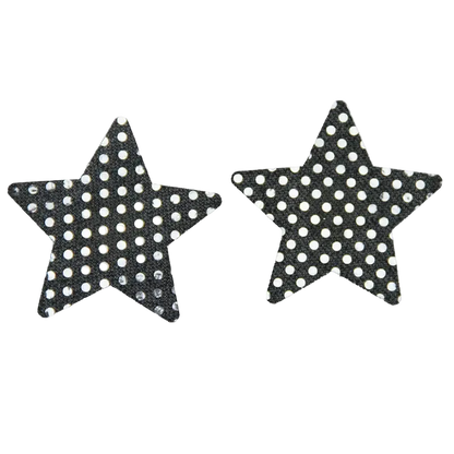 Two black star-shaped accessories with a white polka dot pattern, displayed side by side on a plain white background.