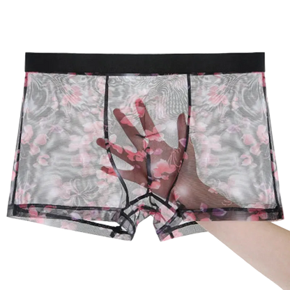 Floral patterned underwear with sheer panels on a white background