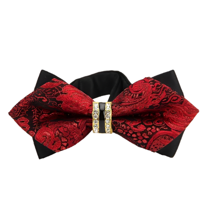 Red and black bow tie with a decorative clasp on a white background