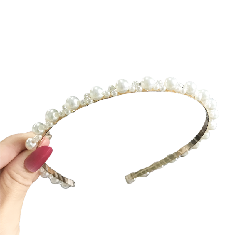 Elegant sunflower pearl hairband with vintage chain accents - perfect for resort day-to-night styling