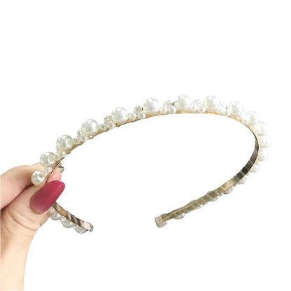 Elegant sunflower pearl hairband with vintage chain accents - perfect for resort day-to-night styling