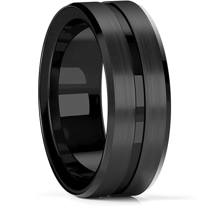 Close-up of the black tungsten ring, highlighting the intricate brick pattern and polished beveled edges.