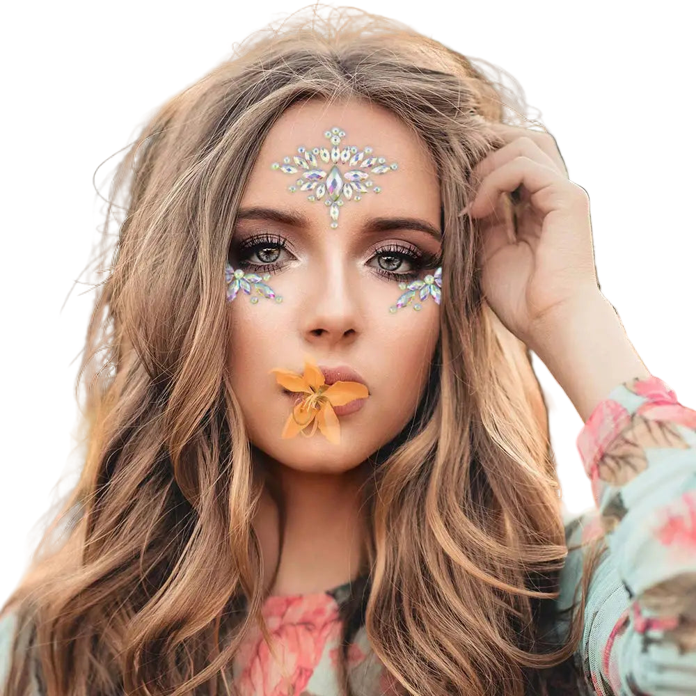 Woman with face paint and floral decorations in a blurred outdoor setting