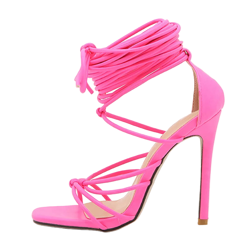 Pink high-heeled sandal with strappy design on a white background
