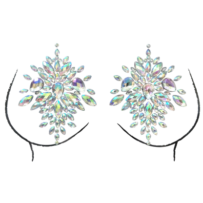 Pair of sparkling earrings on black stands against a white background