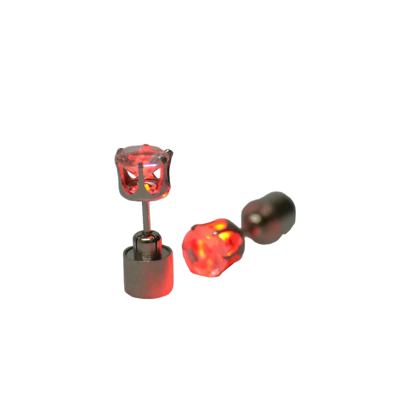 Red LED earrings on a gray background