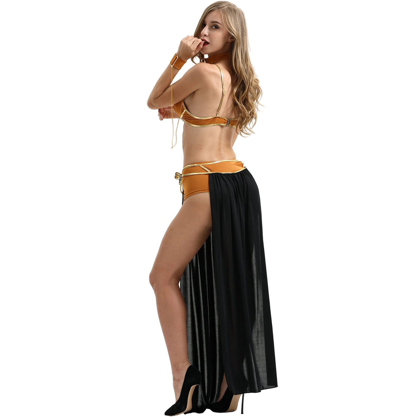 Woman wearing a black and gold bikini with a long black skirt on a white background