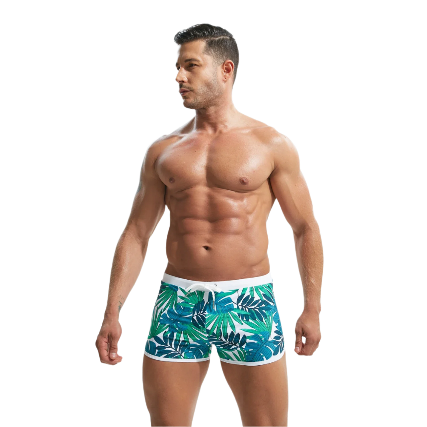 Blue and green leaf-patterned swim shorts with a white waistband.